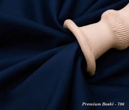 Cream ceramic vase on dark blue premium Boski fabric with texture and drape